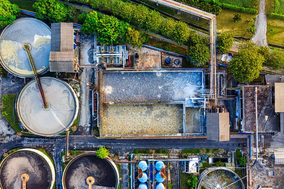 Aerial photograph of wastewater treatment tanks and aeration basins
